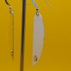 Silver Earrings made from a flatten coffee spoon bowl with added copper stars - Image 4