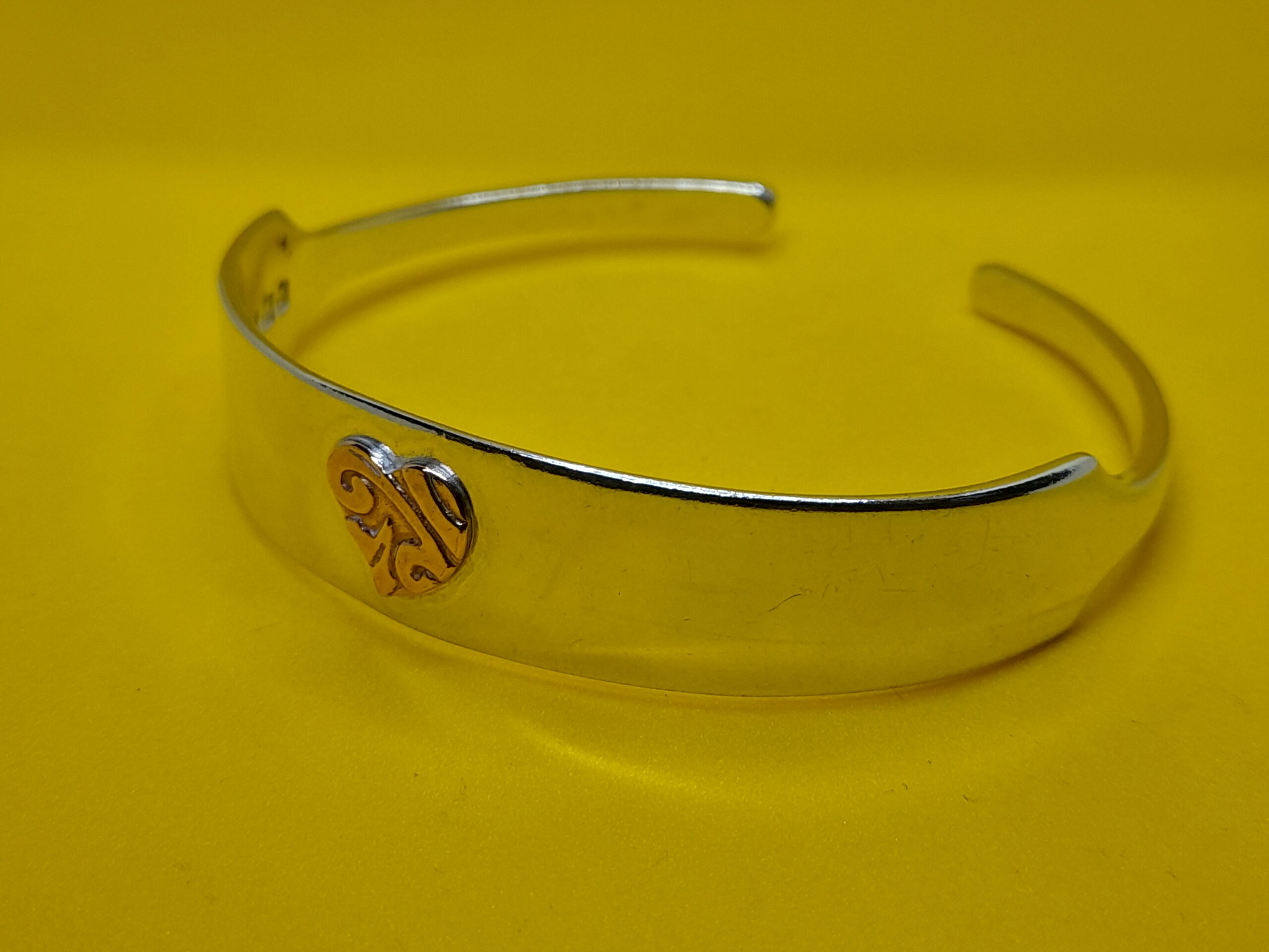 Silver Sugartong Bangle with Patterned Copper Heart - Image 2