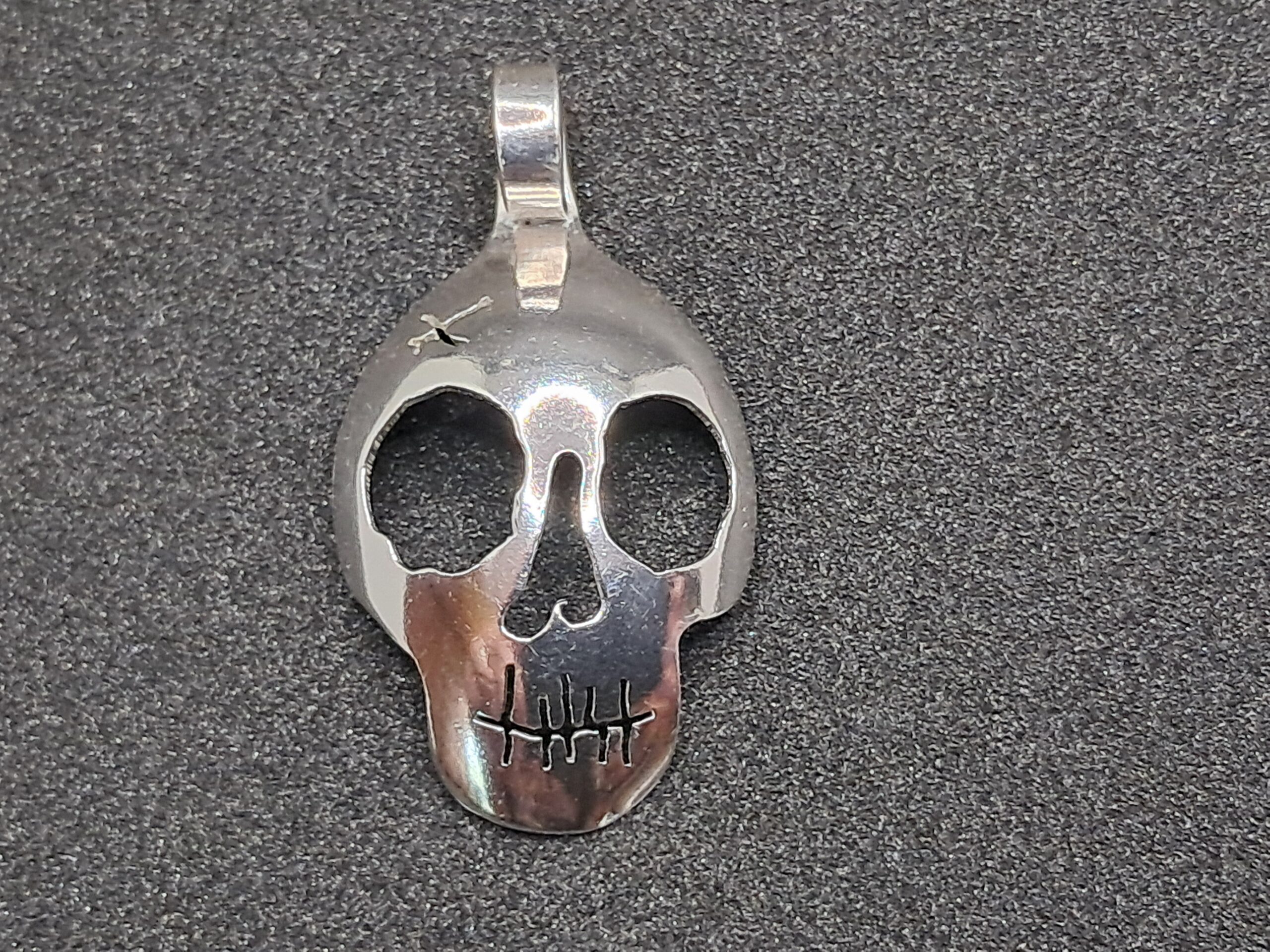 Skull Pendant cut from a Teaspoon bowl